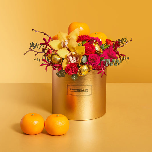 Golden Radiance – Oranges and Flowers Hamper